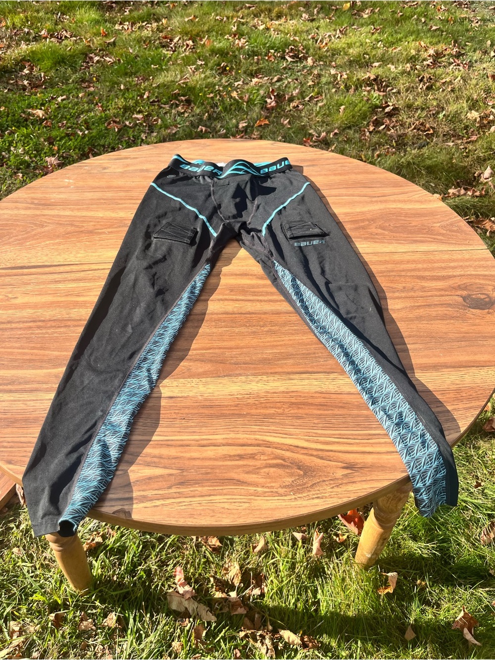 Bauer Black Hockey Compression Pants with Teal Accents